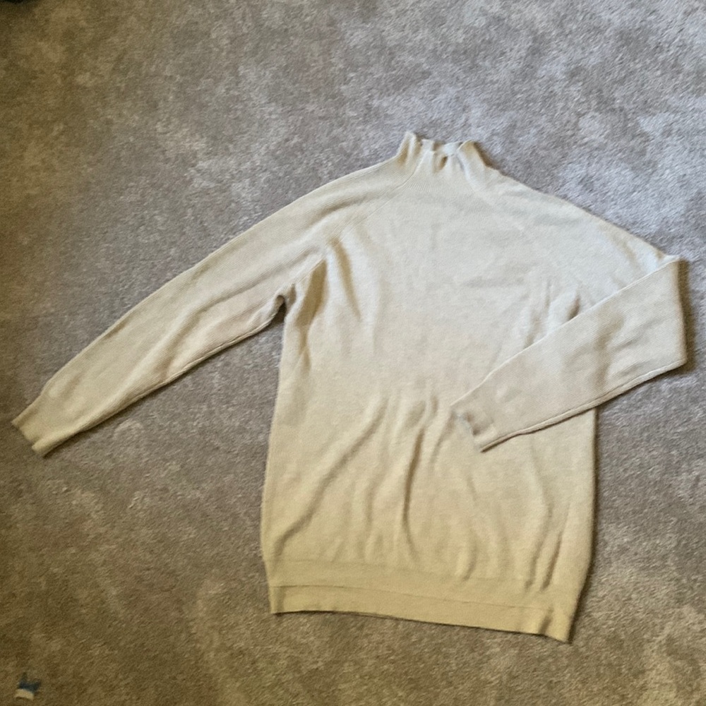 Form fitting mock neck sweater